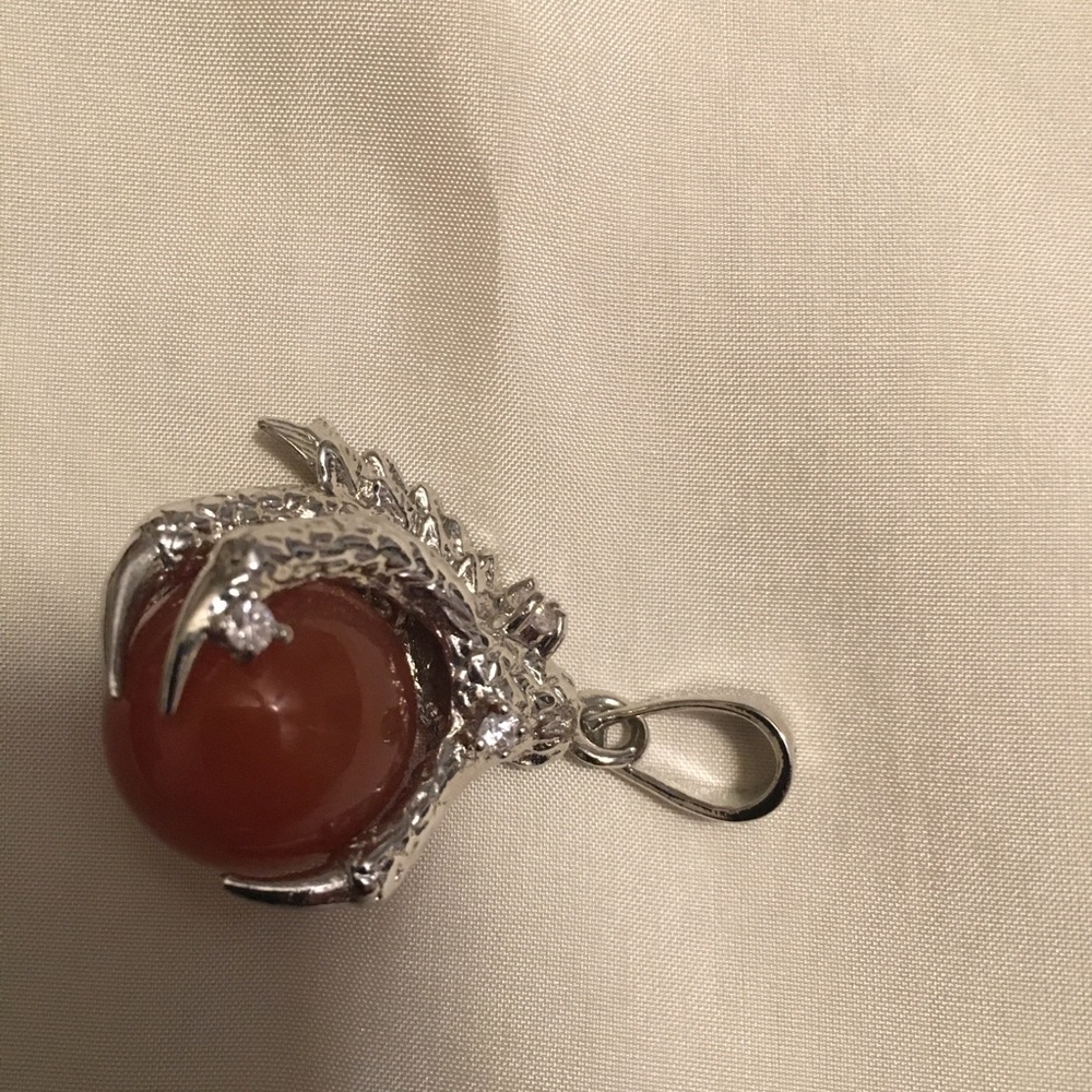 Renaissance Fair Dragon claw pendant.